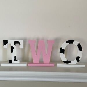 TWO hand painted wooden letters